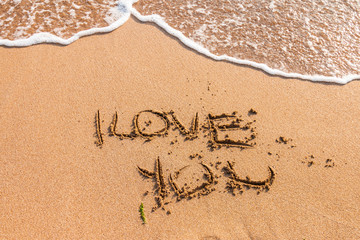 I love you written on the beach