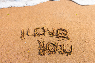 I love you written on the beach