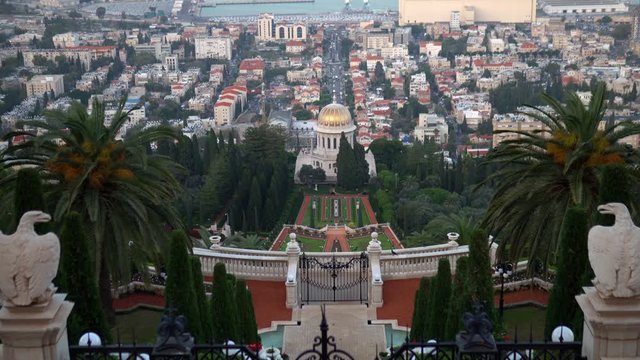 Beautiful Evening november view of Bahai temple and gardens with flying birds. 4K resolution video.