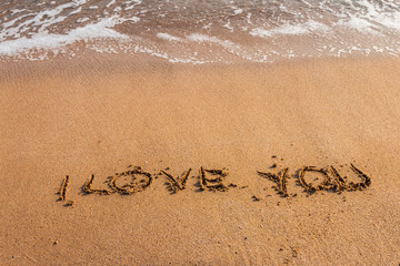 I love you written on the beach