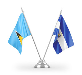 El Salvador and Saint Lucia table flags isolated on white 3D rendering