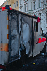 Burned european ambulance arson on the street in Schoneberg Berlin Germany