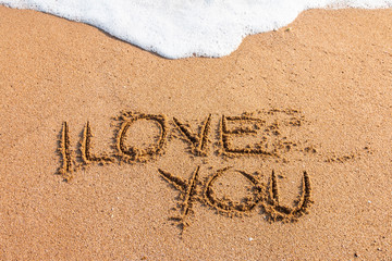 I love you written on the beach