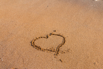 Obraz na płótnie Canvas I love you written on the beach