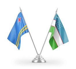 Uzbekistan and Aruba table flags isolated on white 3D rendering