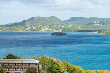 Panoramic landscape and sea scenery behind an old brick structure 