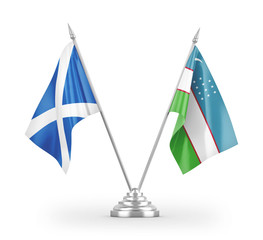 Uzbekistan and Scotland table flags isolated on white 3D rendering