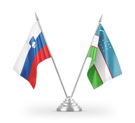 Uzbekistan and Slovenia table flags isolated on white 3D rendering