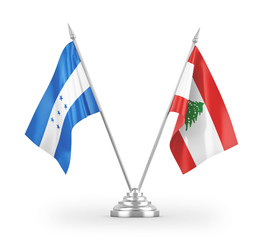 Lebanon and Honduras table flags isolated on white 3D rendering