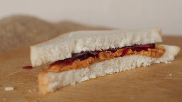 peanut butter and jelly, jam sandwich rotating, turning round, closeup, macro