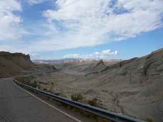 Motorcycle riding toward storm clouds