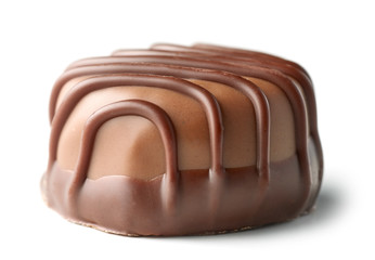 chocolate praline on white background