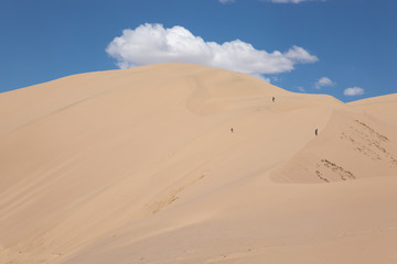 Fototapeta na wymiar Gobi Desert Singing Sand Dunes skiing snowboarding