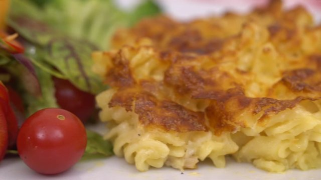 Macaroni timbale and Italian salad, close-up stock video