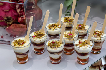 pudding cups with layers of fruit and yogurt 