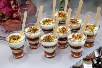 pudding cups with layers of fruit and yogurt 