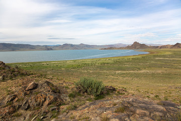 Cloudy view on a mountain lake. Mongolia