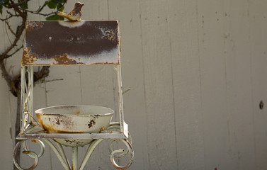 vintage bird feeder with space for text