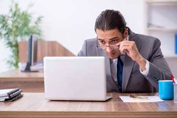 Unhappy male businessman in the office