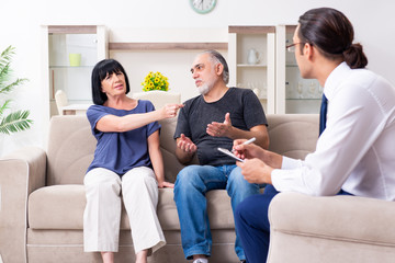 Old couple visiting psychiatrist doctor