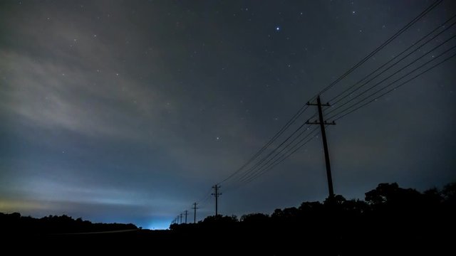 Night Time Lapse on Hill Country Texas With Stars Over Traffic 