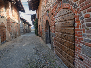 Ricetto di Candelo, old cobblestone streets of the fortified medieval village. Piedmont - Italy