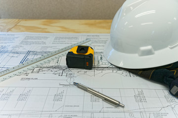 Construction Drawings with hard hat