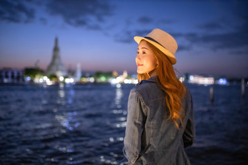 The solo Asian female traveler.Bangkok, Thailand tourist  , Young woman traveler smiling happy vacation concept.