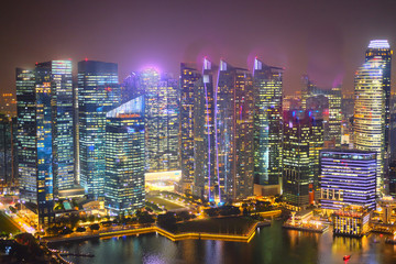 high angle view of singapore financial buildings at night 