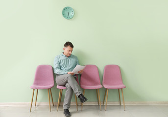 Fototapeta premium Mature man waiting for job interview indoors