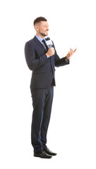 Male journalist with microphone on white background