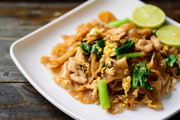 Stir-fried soy sauce rice noodles with pork, Thai food (Pad See Ew)