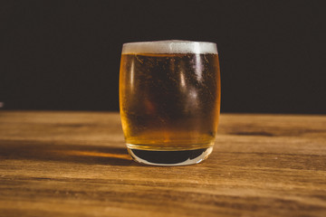 glass of beer with foam