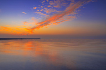 Beautiful colorful of reflection sky on sea water background on early morning, Bahrain