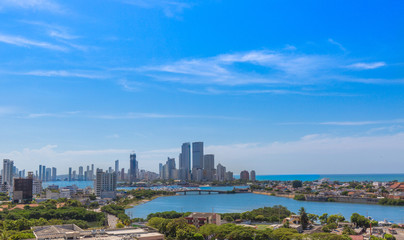 Fototapeta premium Colombia, scenic view of Cartagena cityscape, modern skyline, hotels and ocean bays Bocagrande and Bocachica from the lookout of Saint Philippe Castle