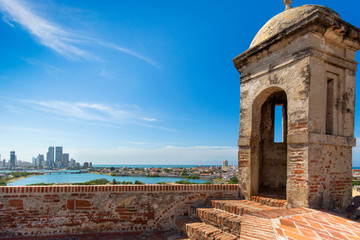 Colombia, scenic view of Cartagena cityscape, modern skyline, hotels and ocean bays Bocagrande and Bocachica from the lookout of Saint Philippe Castle - obrazy, fototapety, plakaty