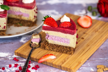 Vegan raw cake made of strawberry and banana cream