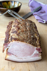 Smoked meat on a wooden table