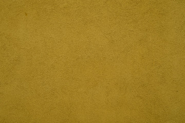 Background with yellow concrete wall painted with paint