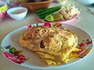 Pad Thai is wrapped in omelette.