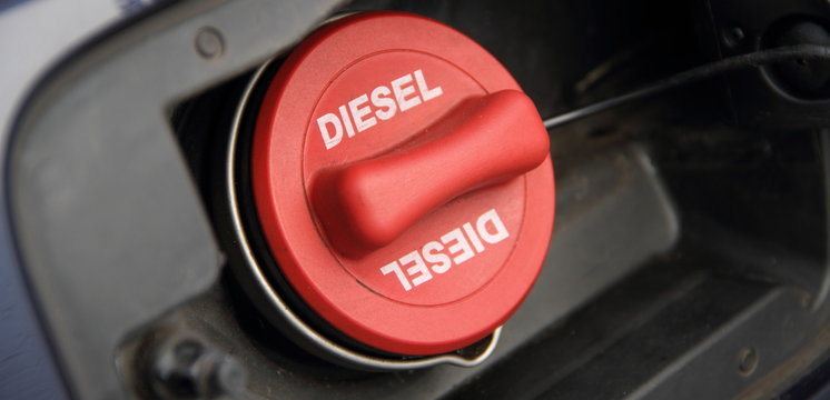 a red fuel cap with the inscription "Diesel"