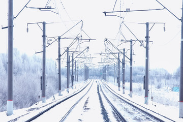 winter railway landscape, view of the rails and wires of the railway, winter delivery way