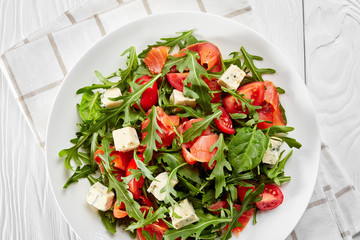 salmon greens blue cheese tomato salad, flat lay