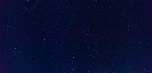 Panorama blue night sky milky way and star on dark background.Universe filled with stars, nebula and galaxy with noise and grain.Photo by long exposure and select white balance.selection focus.amazing