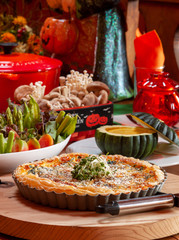 table set for a halloween party , quiche close-up 