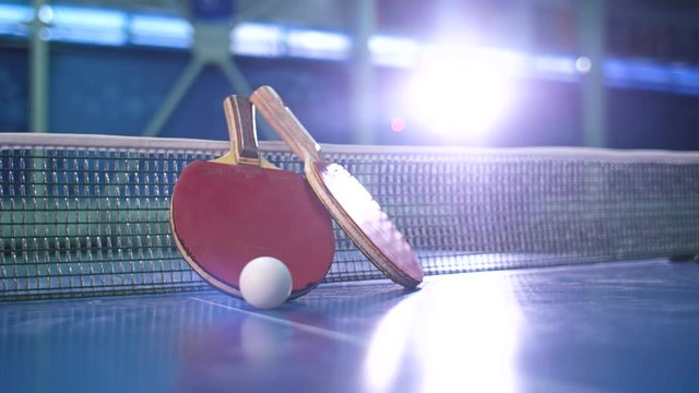 Ping pong paddles and balls