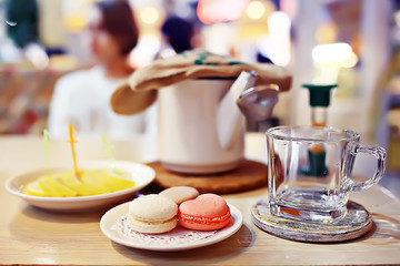 English tea in a cafe / cup and kettle with five o'clock tea