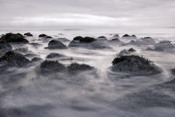 waves on the rocks long exposure