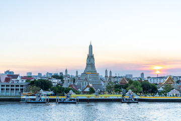in Bangkok with Wat Arun temple and Chao Phraya River at sunset time, Wat Arun are travel destination of Bangkok, Thailand.