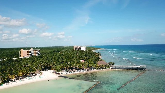 Accending aerial shot over the bay in beautiful mexico junggle